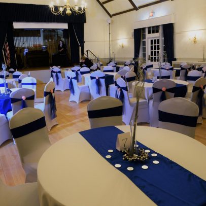 White Tables with Royal Blue Runners